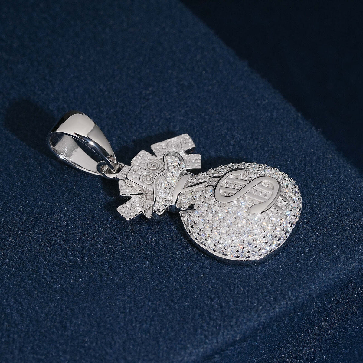Side perspective view showing pave moissanite dollar sign detail and iced out bail
