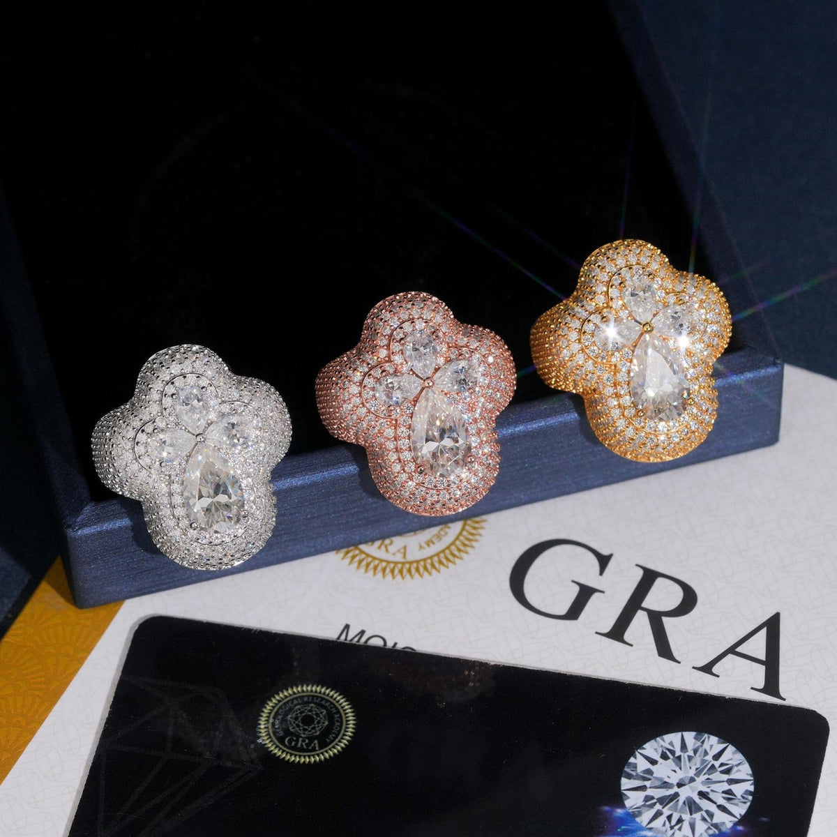 Three tone iced out pear cut moissanite clover statement rings with GRA certificate box