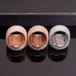 Bottom view showing hollow inner band construction of three color moissanite signet rings