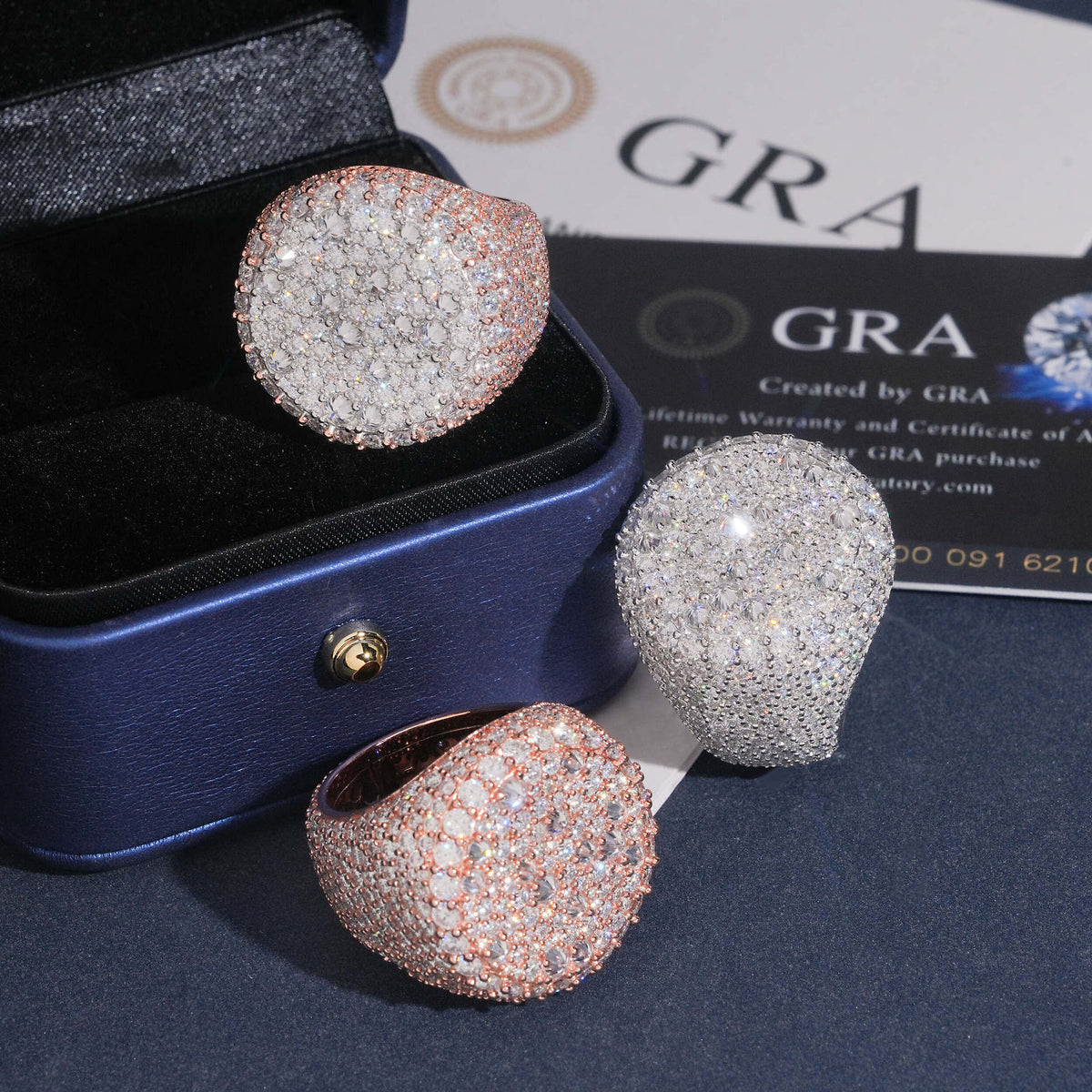 Iced out round flat top moissanite signet rings in navy box with GRA certificates   