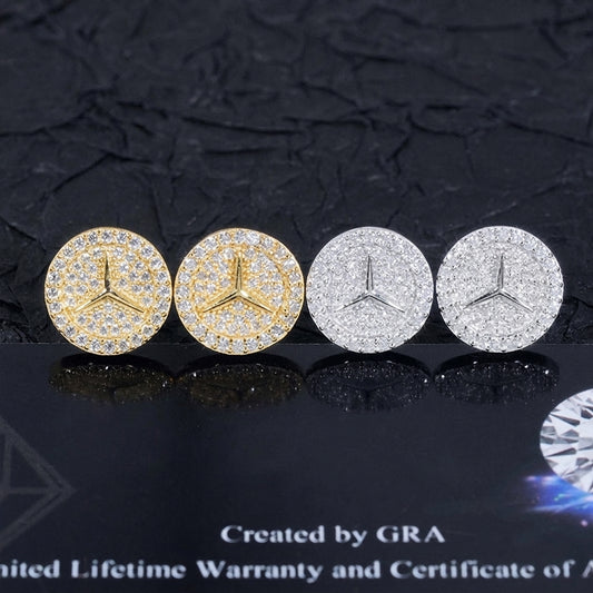 Iced out three-point star emblem moissanite stud earrings in yellow gold and silver on GRA card