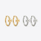 ZERRA Tory Burch Small Eleanor gold logo hoop earrings with monogram design, showcasing a stylish jewelry accessory.
