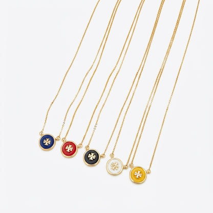 Zerra Jewelry Tory Burch Kira enamel pendant necklace with color block design, featuring a stylish and modern jewelry piece.