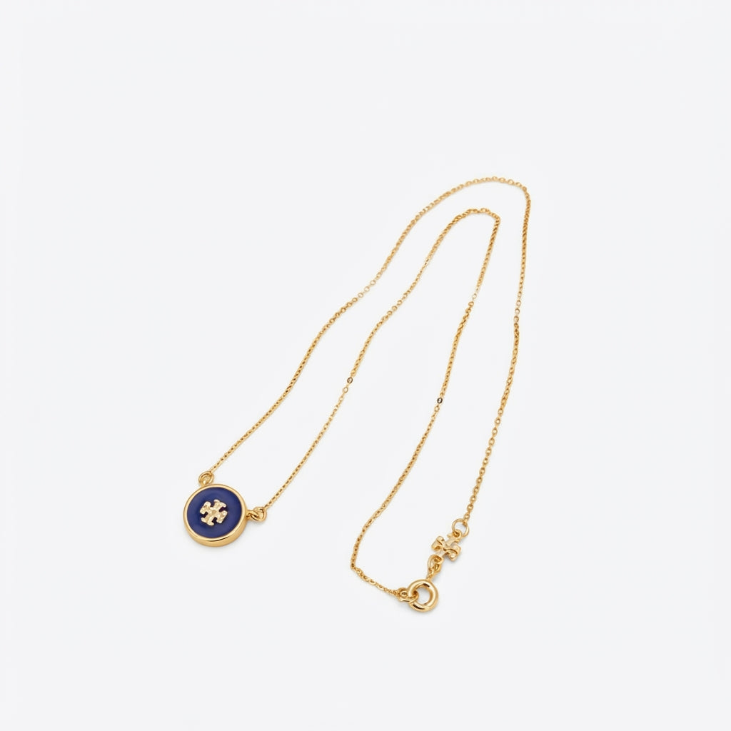 Zerra Jewelry Tory Burch Kira enamel pendant necklace with color block design, featuring a sleek, modern necklace with vibrant enamel accents.