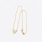 Zerra Jewelry Tory Burch Kira enamel pendant necklace in color block with gold-tone chain and multicolor enamel accents.