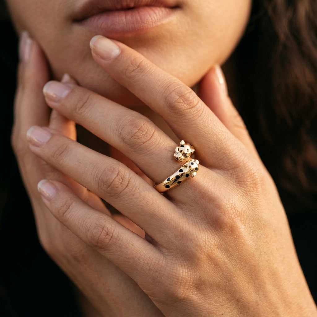 Zerra Jewelry Cartier Panthère de Narrow ring with garnets and black lacquer accents, elegant designer jewelry piece.
