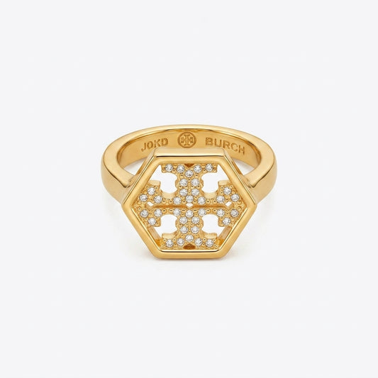 Zerra Jewelry Tory Burch Hexagon Logo pave ring with geometric diamond accents, featuring a stylish gold-tone band and logo design.