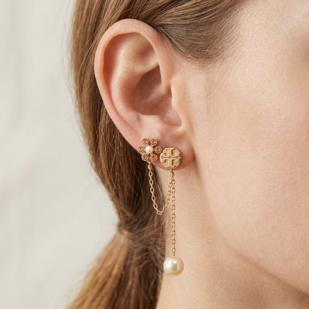 Zerra Jewelry Tory Burch Moondance Pearl Chain Earrings with gold drop studs and elegant pearl accents