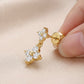 Round Cut Moissanite Floral Cross Dangle Earrings