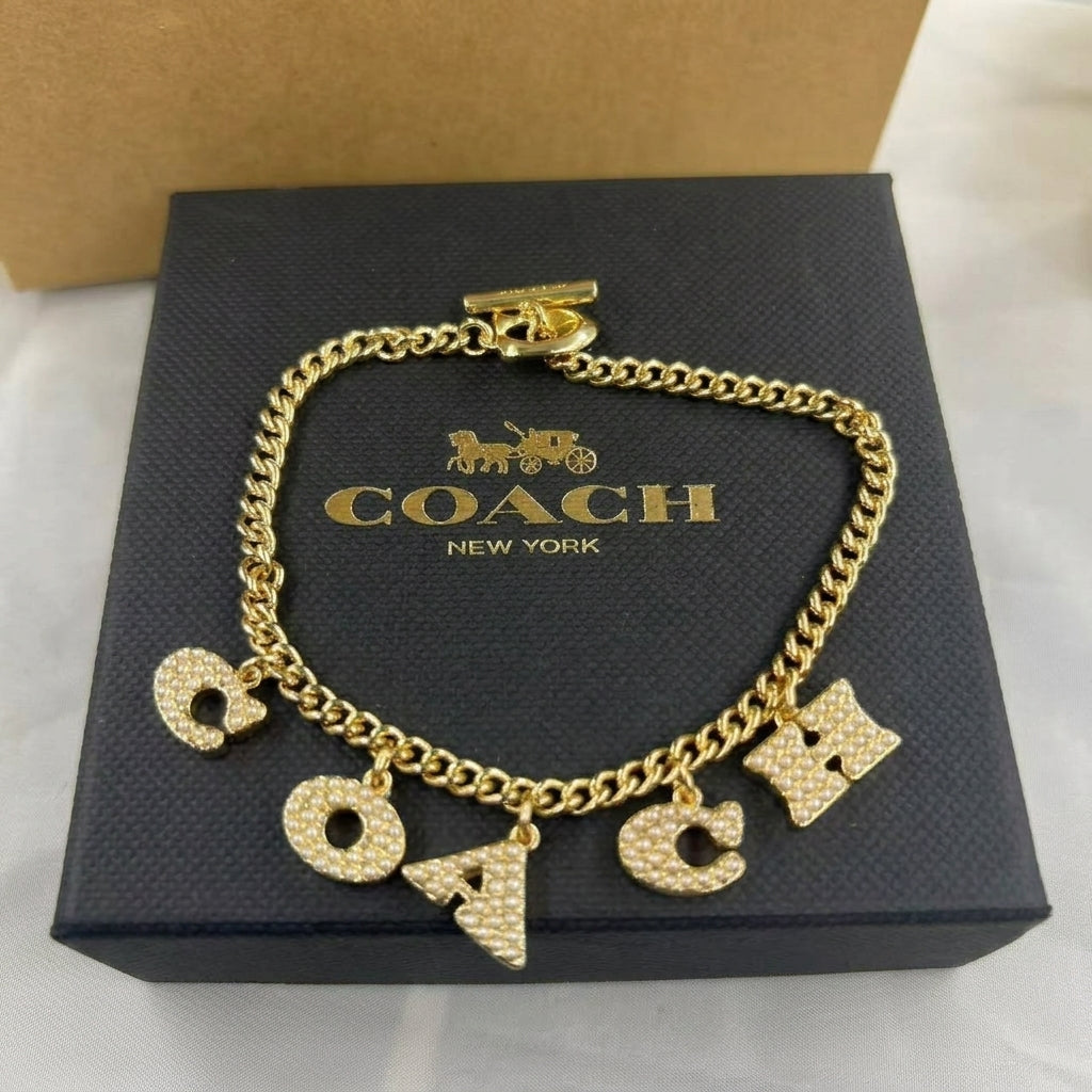 COACH Station  Pave Coach Charm bracelet