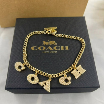 COACH Station  Pave Coach Charm bracelet