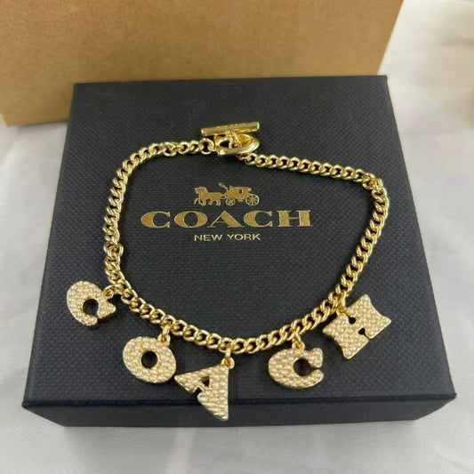 COACH Station  Pave Coach Charm bracelet