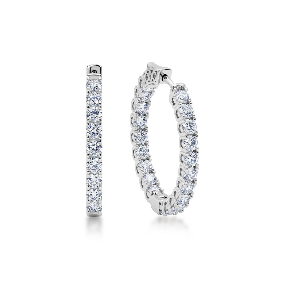 Inside-out round cut lab grown diamond hoop earrings in sterling silver isolated on white background