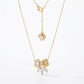 Kate Spade Mom Necklace in polished gold-tone finish with delicate script charm
