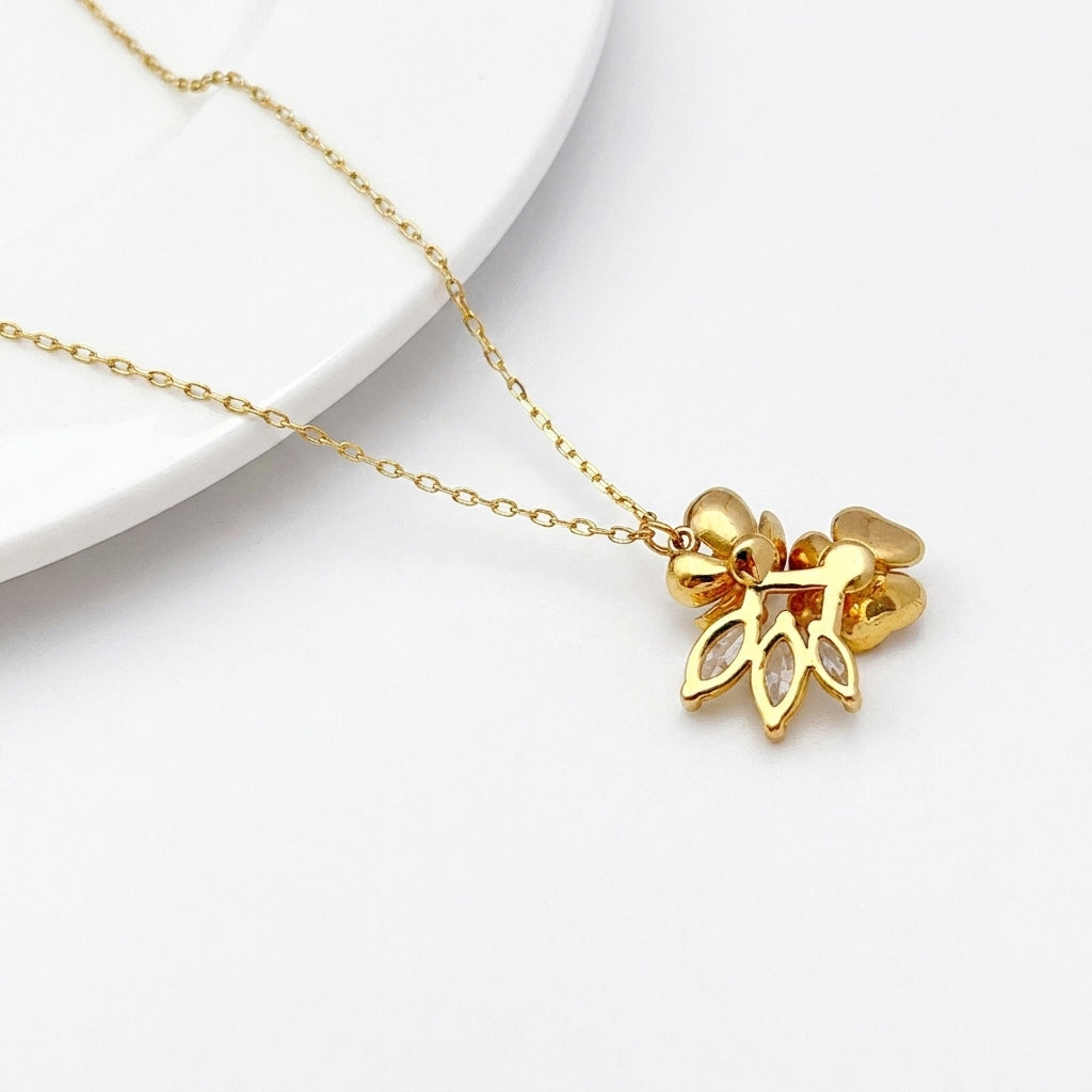 Detailed shot of the lobster clasp and signature Kate Spade heart or spade charm on the extender