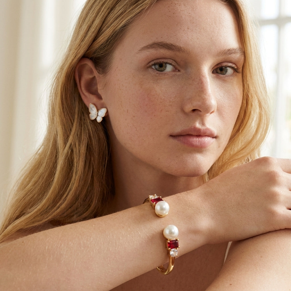 Model wearing Kate Spade Pearls of Wisdom Red Bracelet, a chic statement for daily luxury