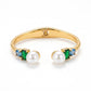 Kate Spade Pearls of Wisdom green Bracelet featuring red enamel accents and high-luster pearls