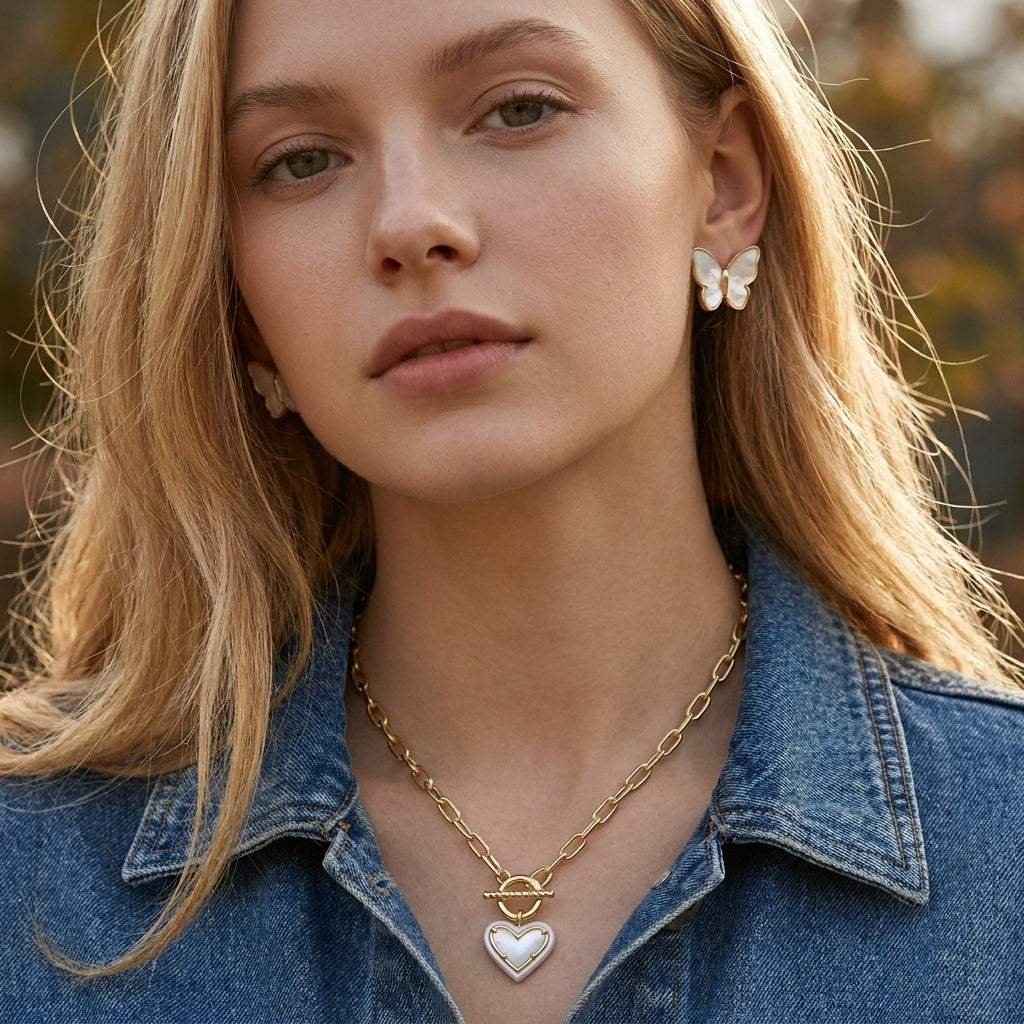 Model wearing Kendra Scott Ari Heart Pearl Necklace, a romantic and minimalist accessory