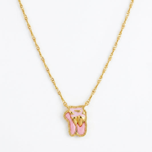 Kendra Scott Ballet short pendant necklace in gold featuring pink enamel ballet slippers charm.