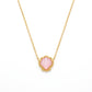 Kendra Scott Brynne Shell gold pendant necklace featuring a vibrant pink scalloped stone.