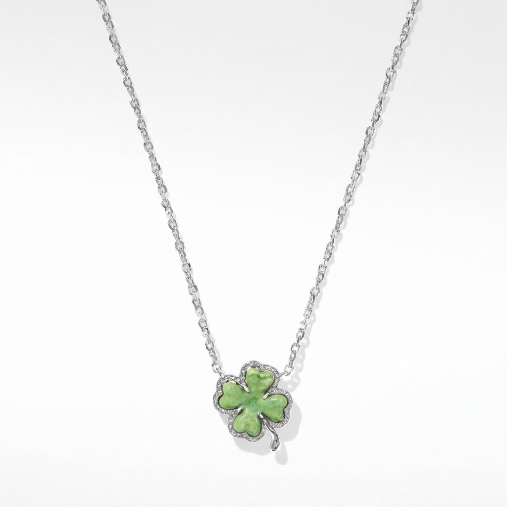 The Kendra Scott clover short pendant necklace in rhodium-plated silver featuring a lucky green stone.