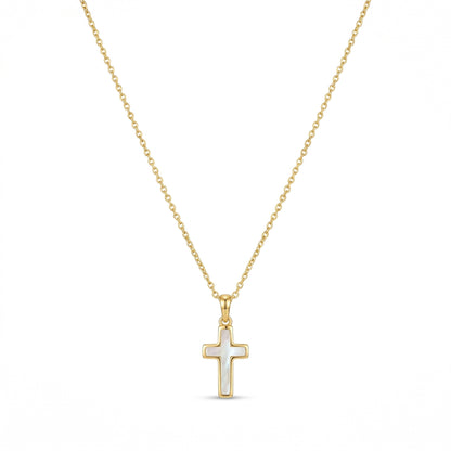 Kendra Scott cross pendant necklace in gold with an inlaid white stone on a white background
