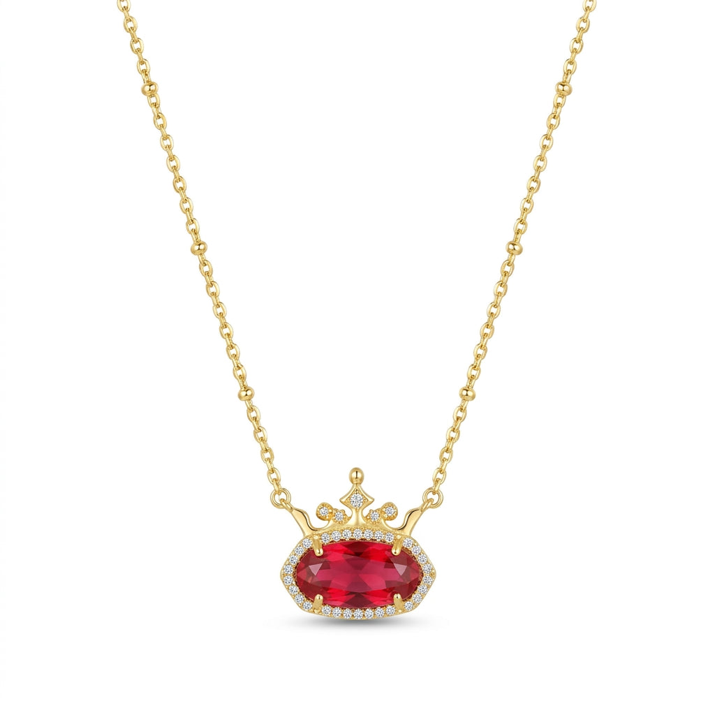 Kendra Scott x Disney Elisa Princess short pendant necklace in gold with a ruby red stone and crystal crown.