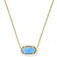 Kendra Scott Elisa gold pendant necklace with a vibrant light blue Kyocera opal stone.