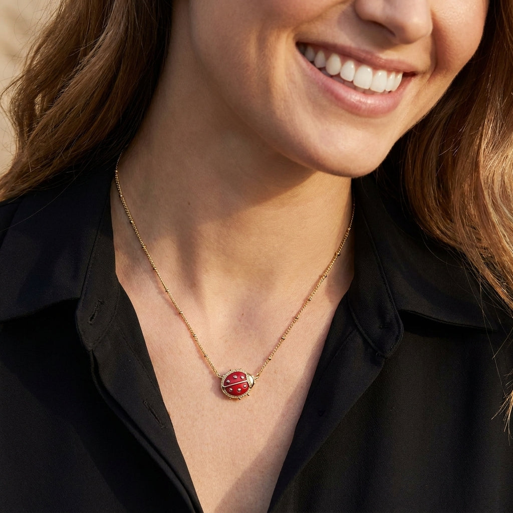 Model wearing Kendra Scott Ladybug Pendant Necklace, a charming minimalist jewelry piece