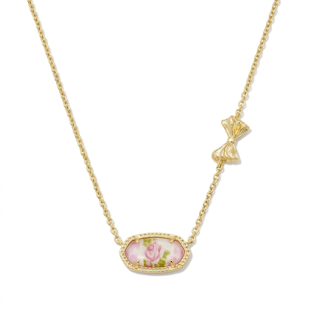 The Kendra Scott x LoveShackFancy Elisa Marie short pendant necklace in gold with a romantic pink floral rose pattern.