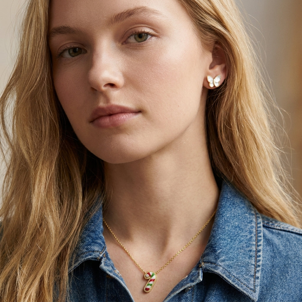 Model wearing Kendra Scott Multicolor Candy Cane Necklace, a vibrant accessory for holiday styling