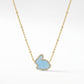 Kendra Scott Rabbit short pendant necklace in gold with a light blue dyed magnesite stone.