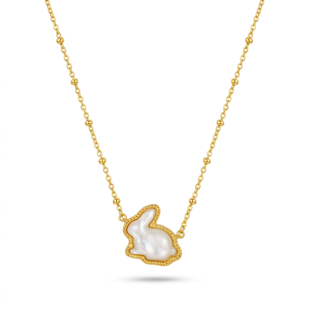Kendra Scott Rabbit short pendant necklace in gold featuring a white mother of pearl rabbit charm.