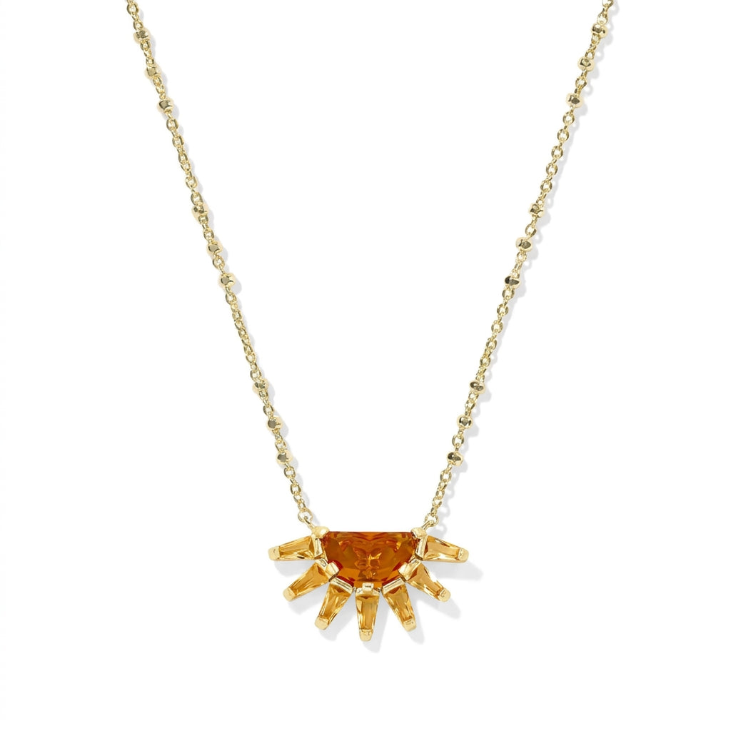 Kendra Scott Samantha Sun short pendant necklace in gold with an orange glass mosaic sunburst charm.