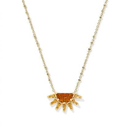 Kendra Scott Samantha Sun short pendant necklace in gold with an orange glass mosaic sunburst charm.