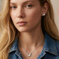 Model wearing Kendra Scott Golf Silver Necklace, a chic accessory for an active lifestyle