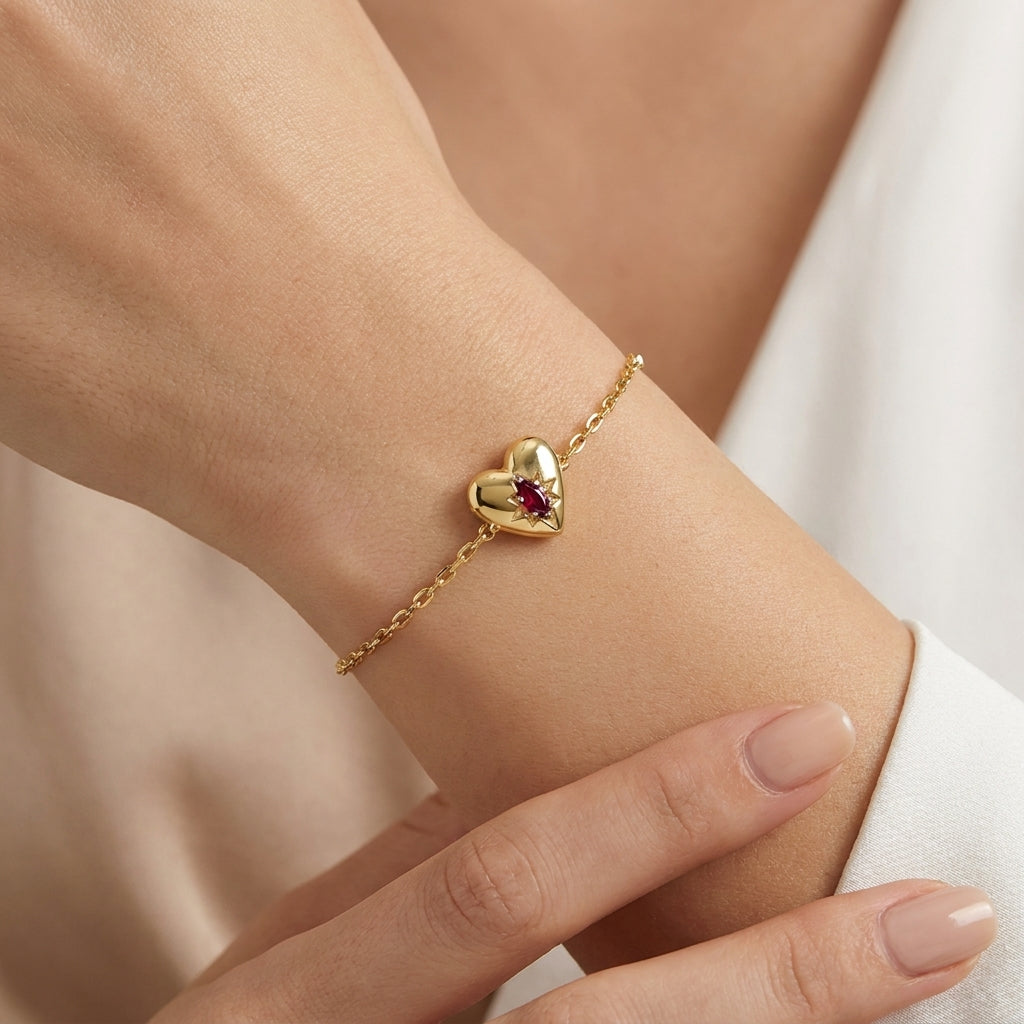 Model wearing Kendra Scott Bold Heart Vermeil Bracelet, a timeless luxury statement piece