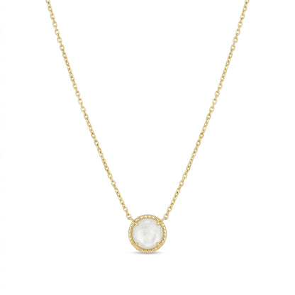 Kendra Scott Volleyball short pendant necklace in gold with a round white mother of pearl stone.