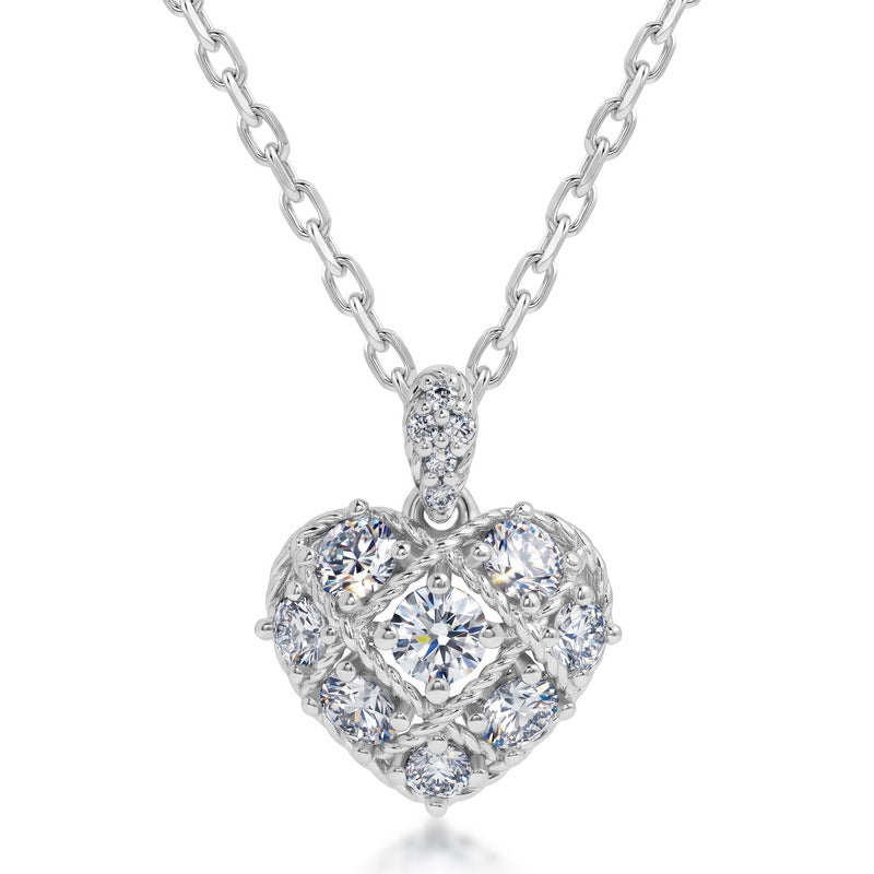 Lab grown diamond heart pendant necklace in silver with quilted lattice pattern and pave bail.
