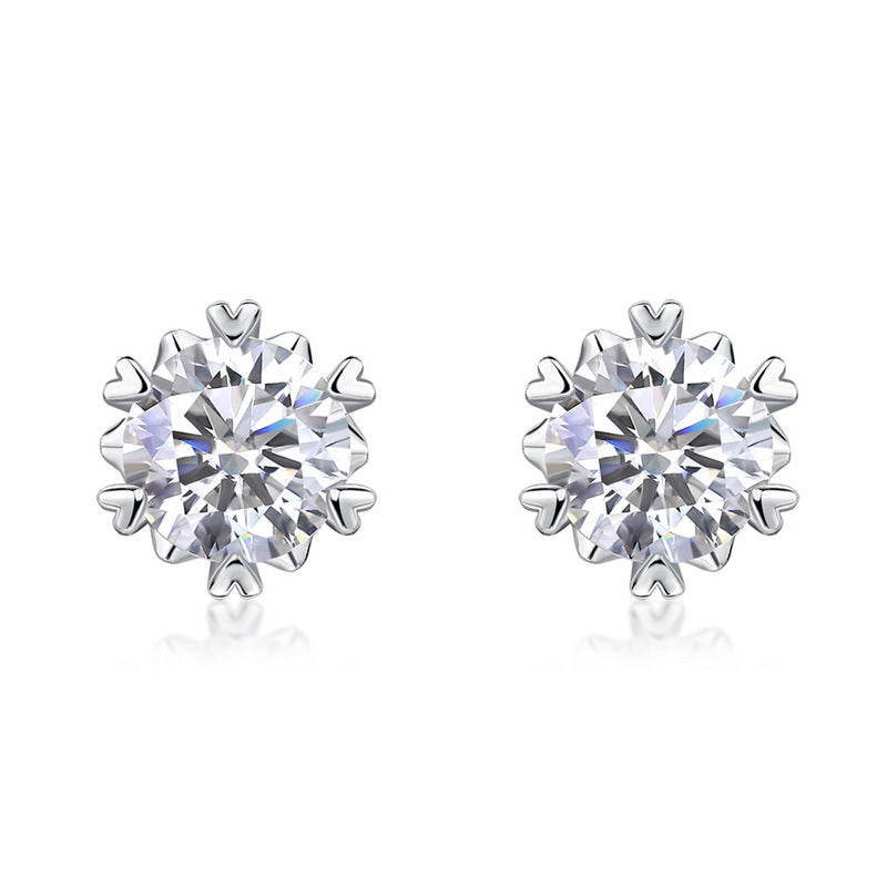 Lab grown diamond snowflake stud earrings with 6 heart shaped prongs in 925 sterling silver.