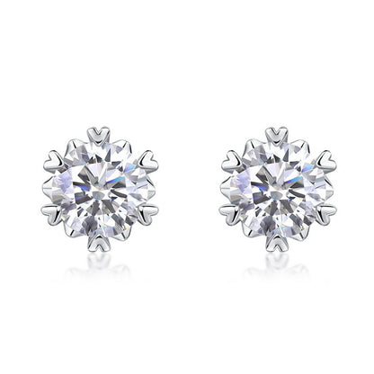 Lab grown diamond snowflake stud earrings with 6 heart shaped prongs in 925 sterling silver.