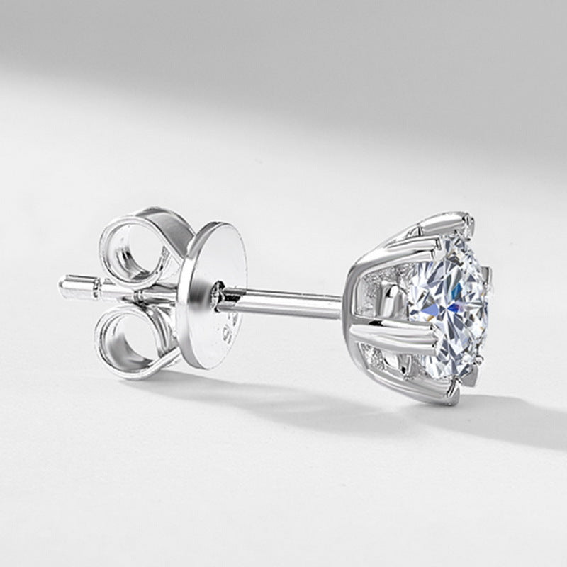 Close-up view of post and butterfly backing on lab grown diamond snowflake stud earrings.