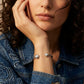 Model wearing LOEWE Silver Anagram Bracelet, a chic and minimalist accessory for modern luxury