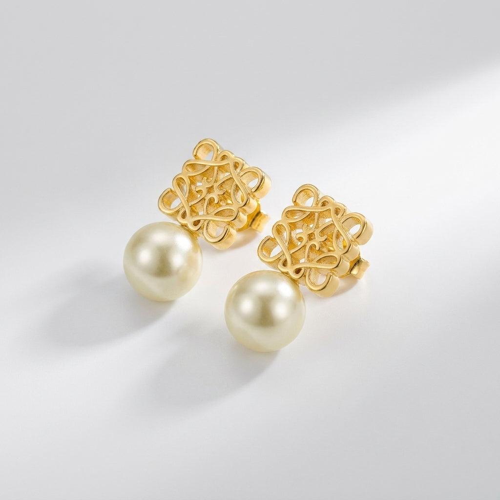 Loewe Anagram Geometric Pearl gold Earrings featuring an openwork logo and natural pearl drop