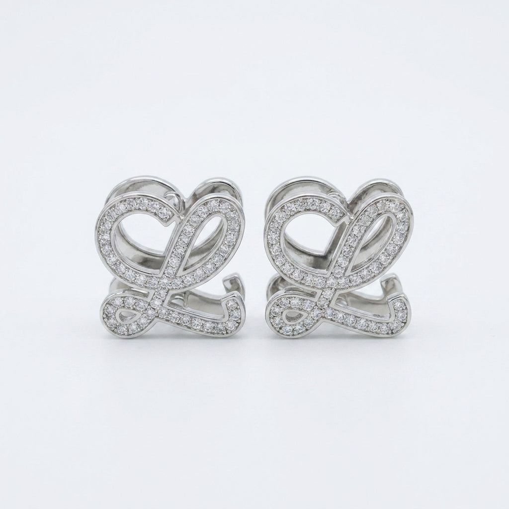 Loewe Anagram Geometric Earrings in a polished gold-plated modern logo stud design