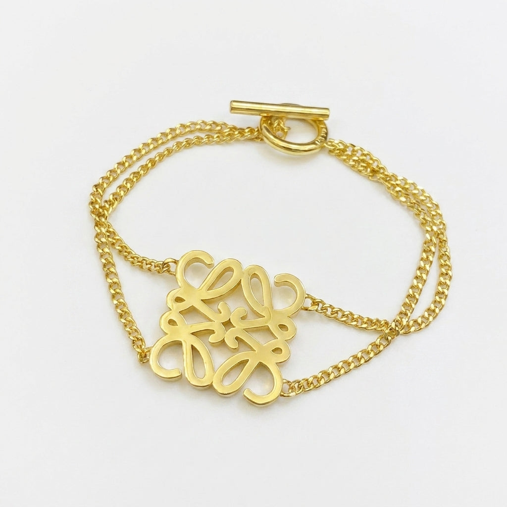 Loewe Anagram gold Metal Bracelet featuring the iconic openwork logo in a polished finish