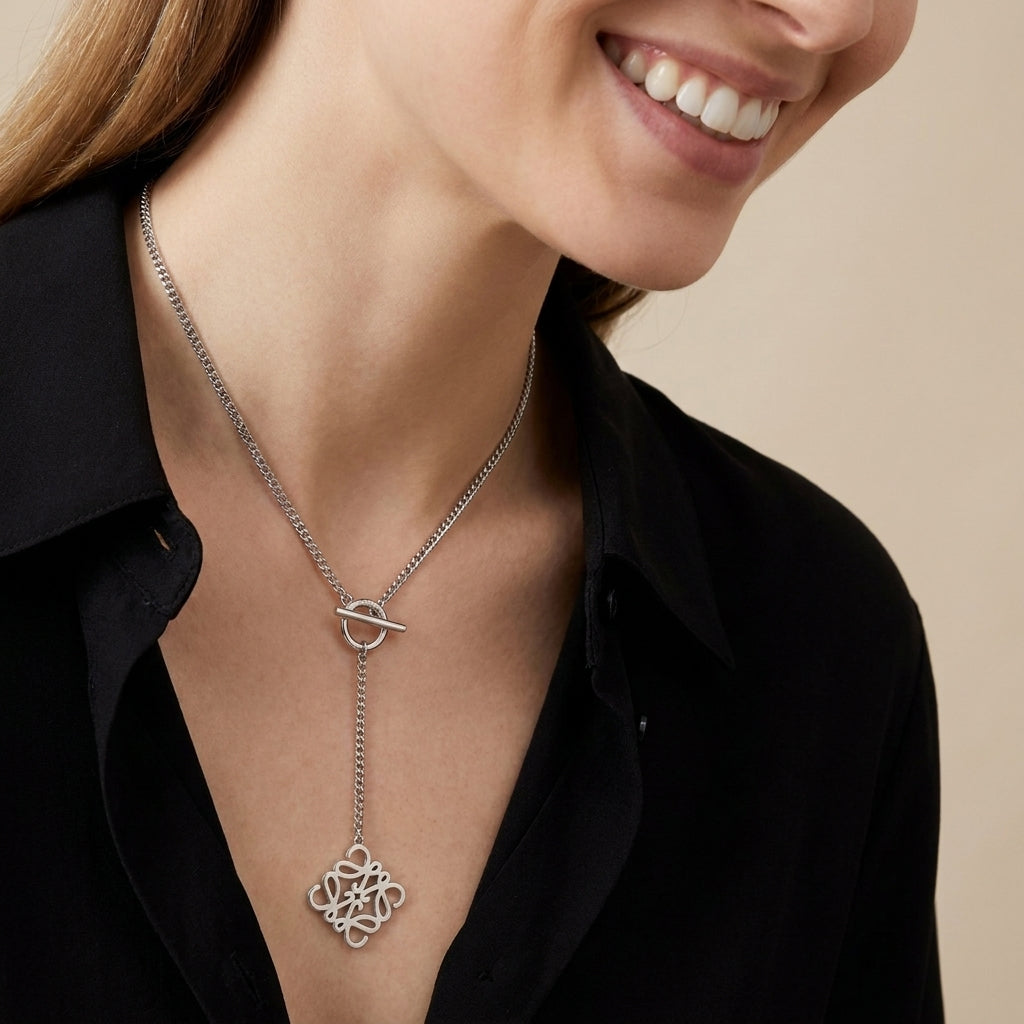 Model wearing LOEWE Silver OT Necklace, a sophisticated statement piece for modern luxury