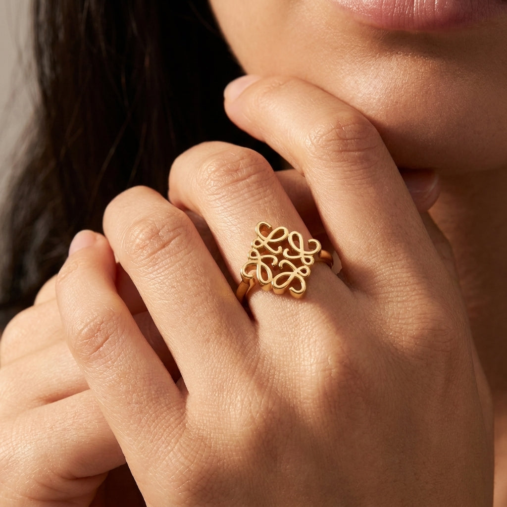Model wearing Loewe Silver Anagram Ring, a chic minimalist statement piece for daily luxury