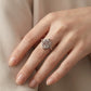 Model wearing Loewe Silver Anagram Ring, a chic minimalist statement piece for daily luxury