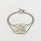 Loewe Anagram Silver Metal Bracelet featuring the iconic openwork logo in a polished finish